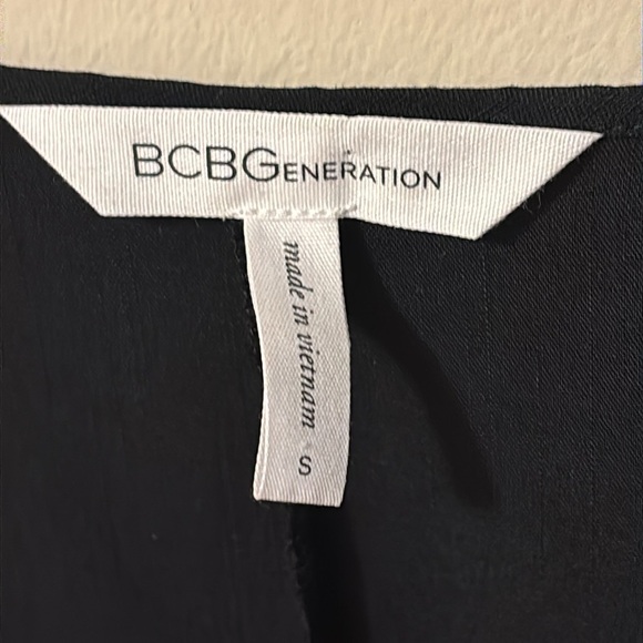 BCBGMaxAzria Elegant Black Wrap Blouse - Picture 2 of 7